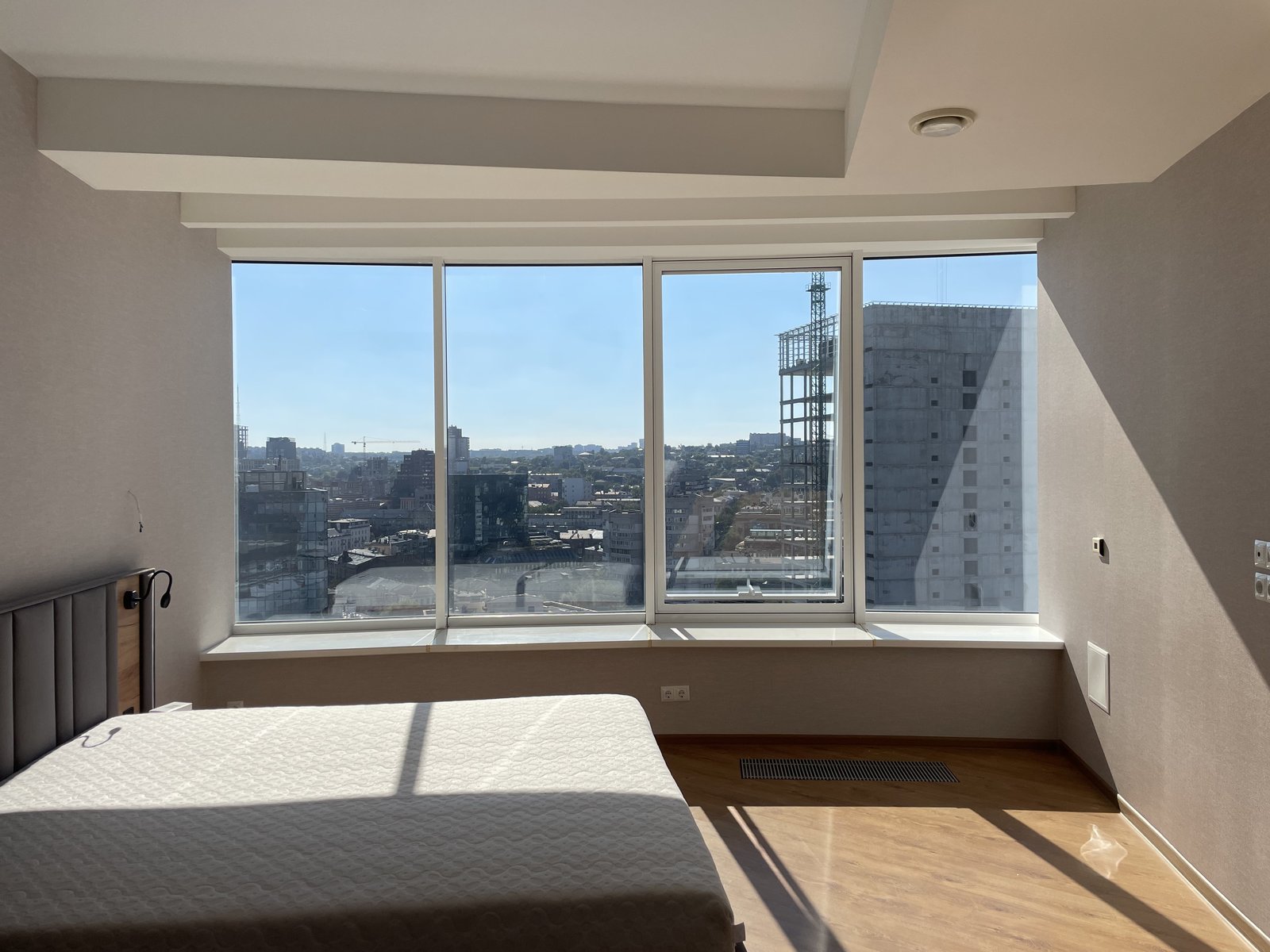 Bedroom before - empty windows