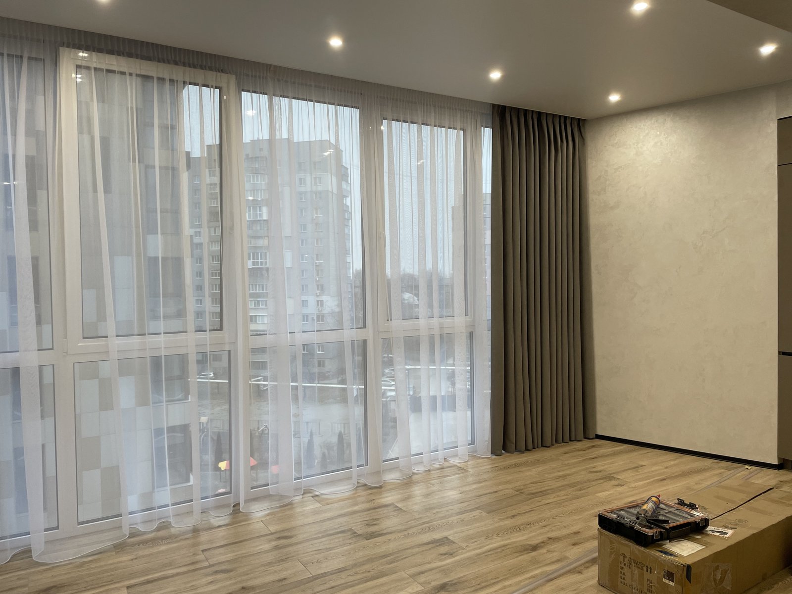 Living room after - floor-to-ceiling curtains