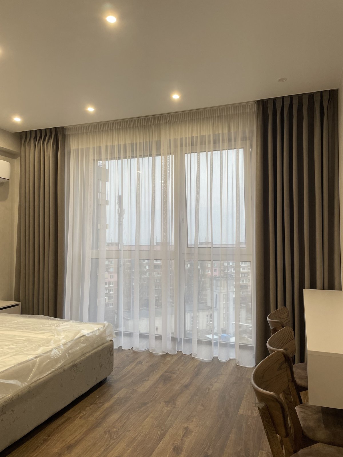 Classic bedroom with double-layer curtains